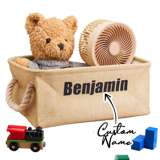 Toy basket with teddy bear, wooden fan, and toys on a beige background