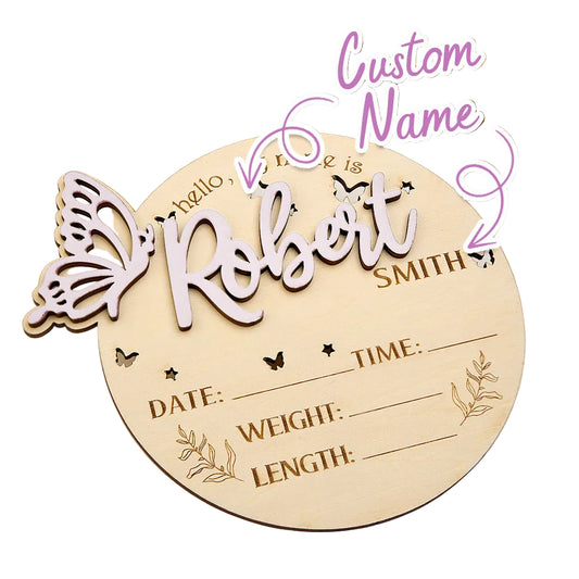 Wooden baby milestone plaque with butterfly designs and customizable text on a neutral background.