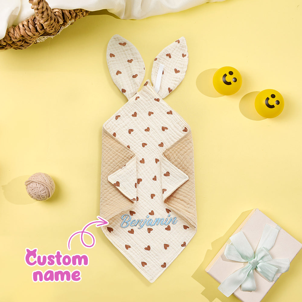 Baby blanket with bunny ears and heart pattern on a yellow background, featuring the name 'Benjamin'.