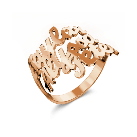 Rose gold ring with 'Don't stop believing' engraving on a white background