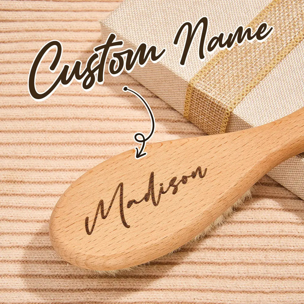 Wooden spoon with engraved name 'Madison' on a textured beige background
