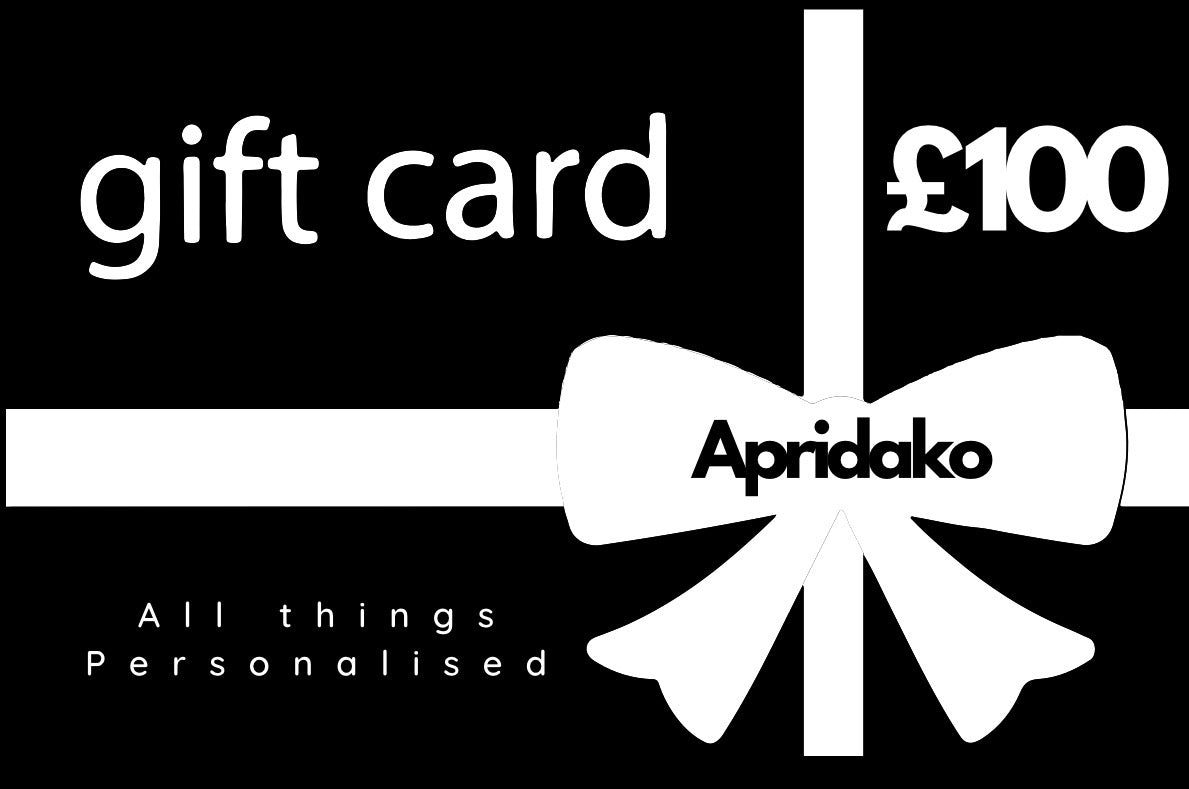 Gift card with a white bow and 'Apridako' branding on a black background