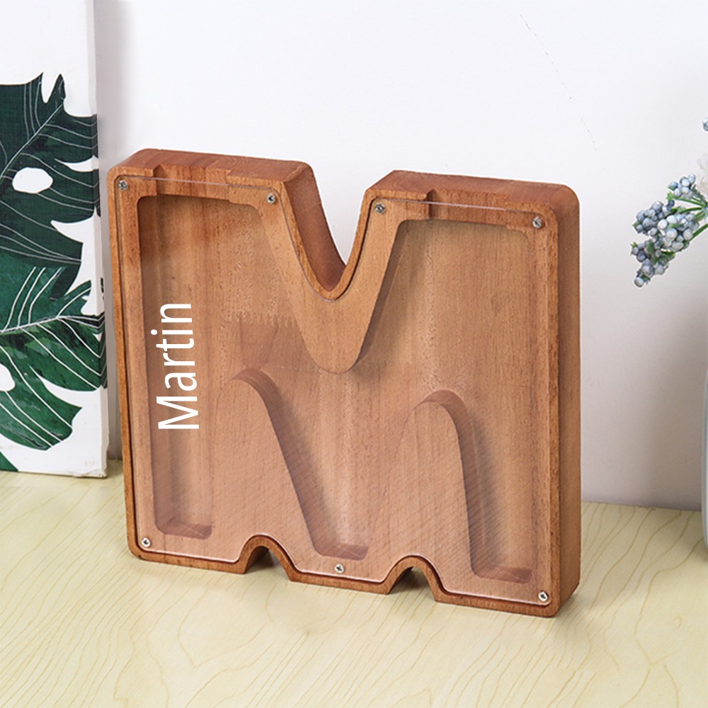 High-quality wood material, clear texture, environmentally friendly and durable
A-Z 26 letters shapes design, large storage space, retro style, classic and advanced
Laser engraved text, clear lettering, bright colors, no fading
The money deposit port is on the top of the box, which can be used to store various currencies