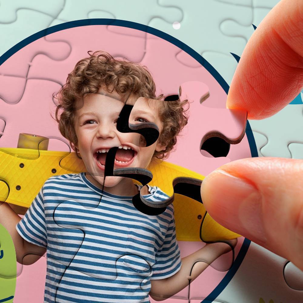 Child with sunglasses on a puzzle piece, hand holding the edge
