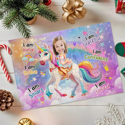 A personalized jigsaw puzzle featuring a girl riding a rainbow unicorn with Christmas-themed holiday decorations around it on a white wooden surface.