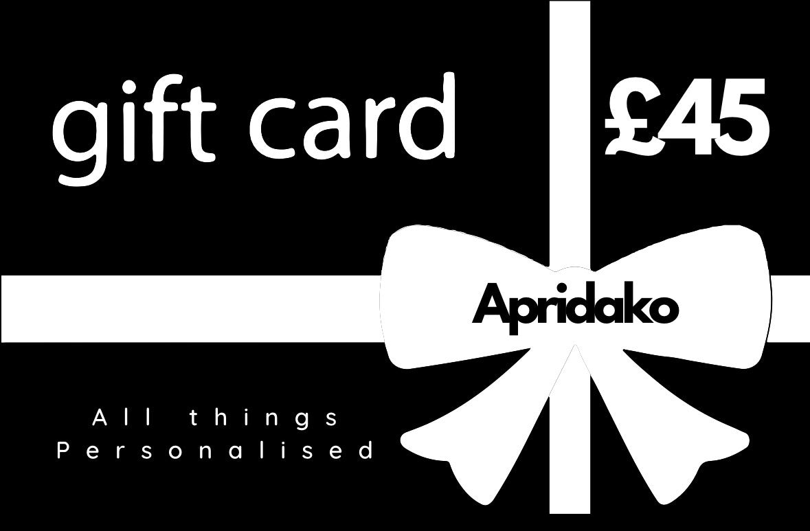 Gift card with a white bow and 'Apridako' branding on a black background