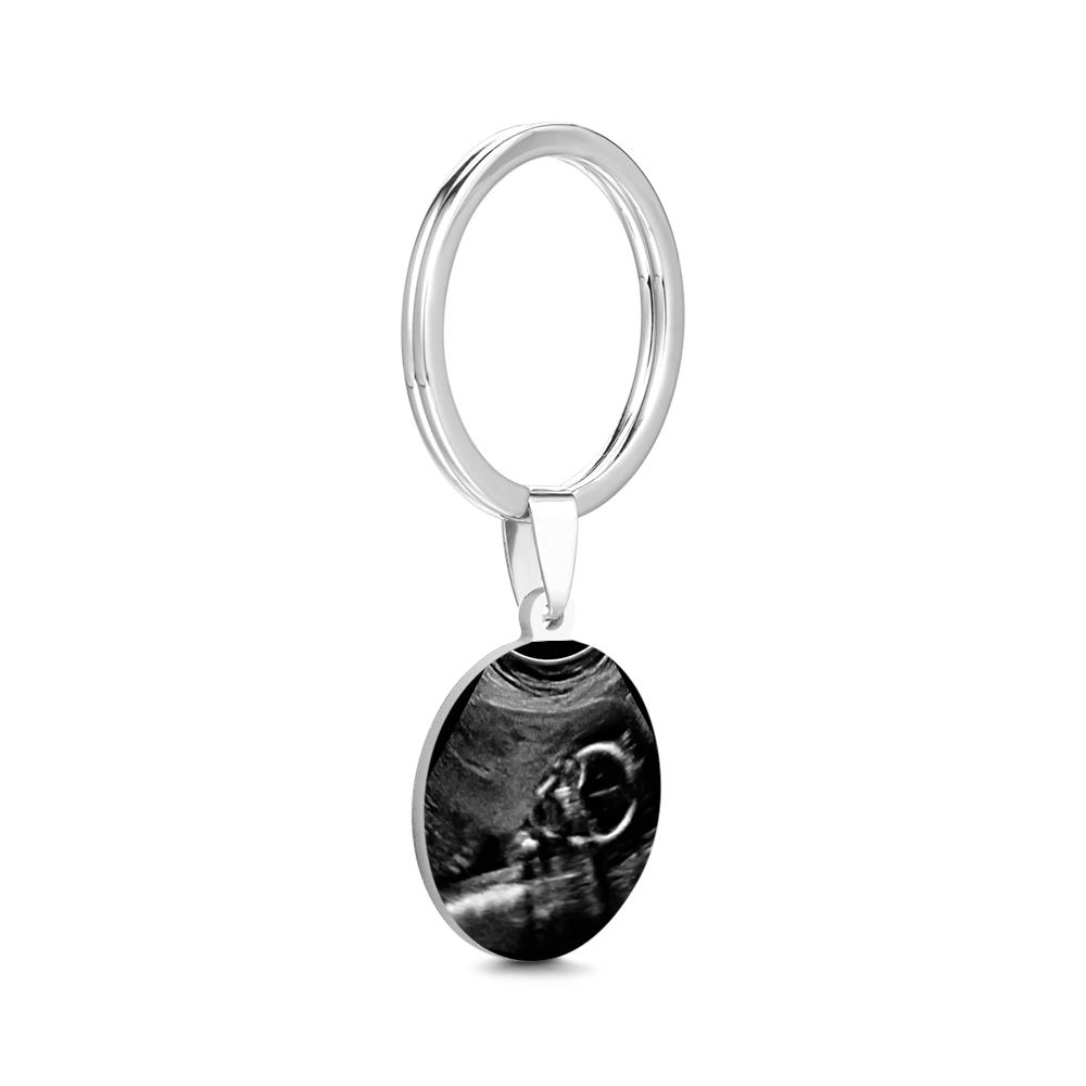 Keychain with a circular pendant on a white background
