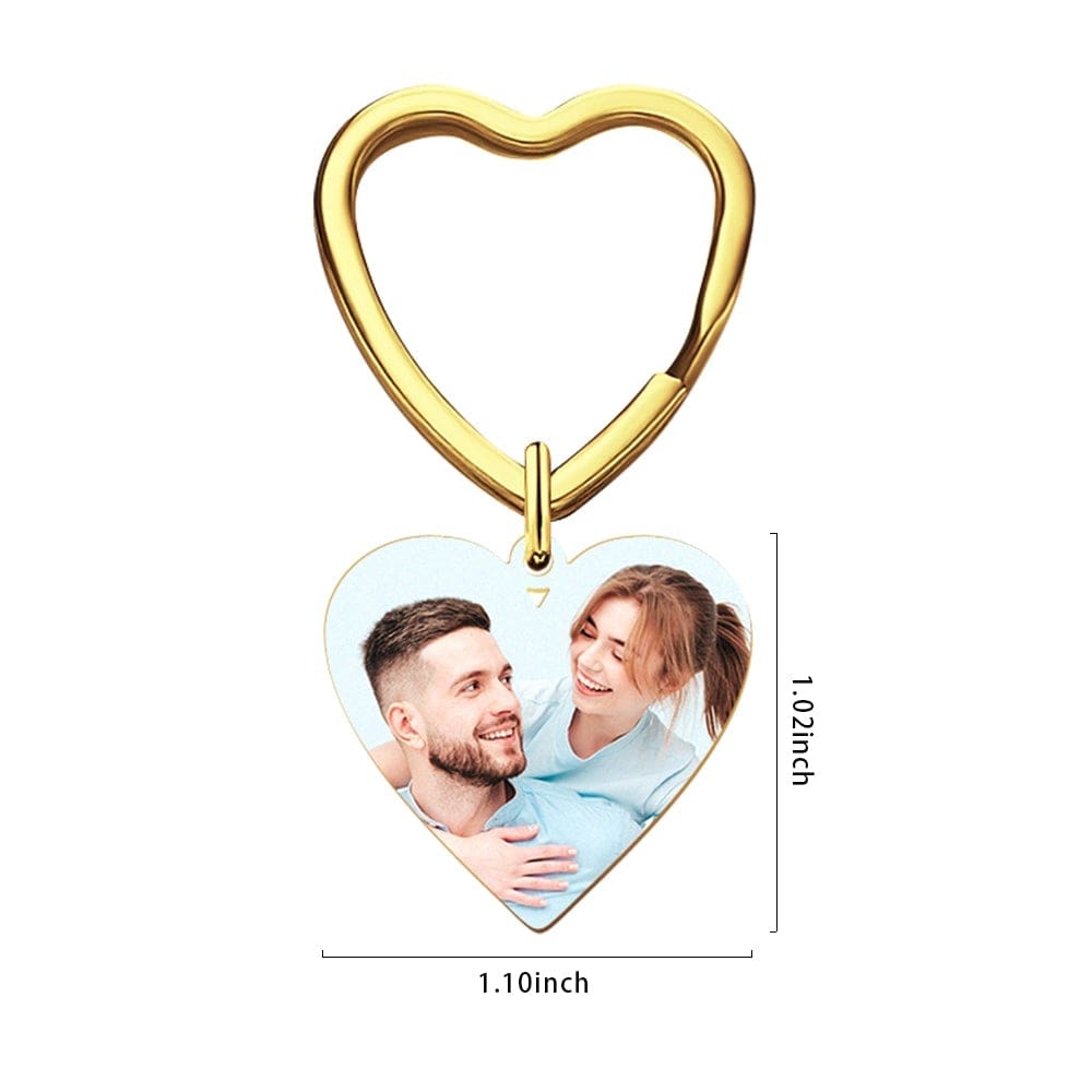 Heart-shaped keychain with a photo of a couple and gold accent, with dimensions indicated.