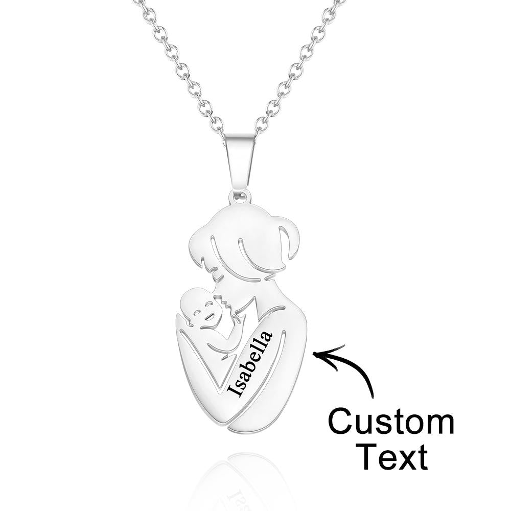 Silver necklace with heart-shaped pendant engraved with 'Isabella' on a white background