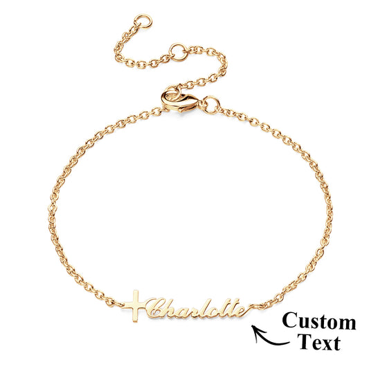 Gold bracelet with 'Charlotte' text on a white background