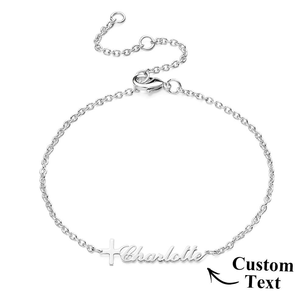 Silver bracelet with 'Charlotte' engraved on a white background