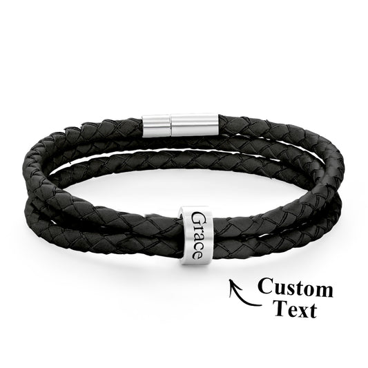 Black braided leather bracelet with a silver clasp on a white background