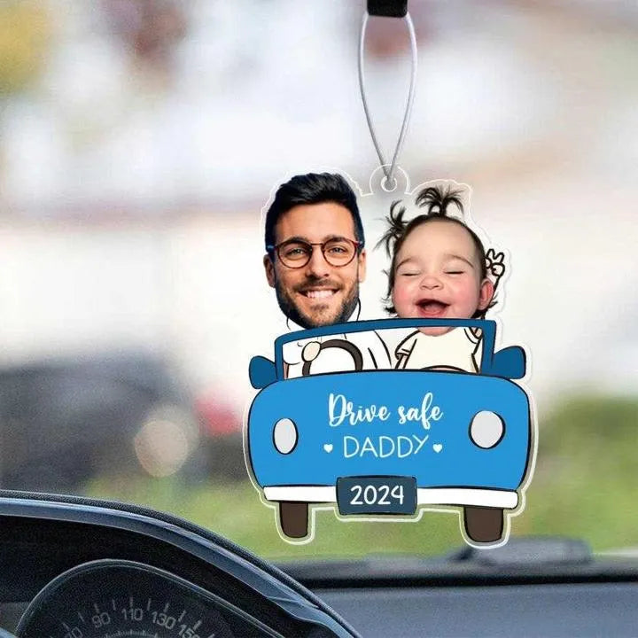 Car air freshener with a man and child in a blue car, featuring 'Drive safe DADDY 2024' text.