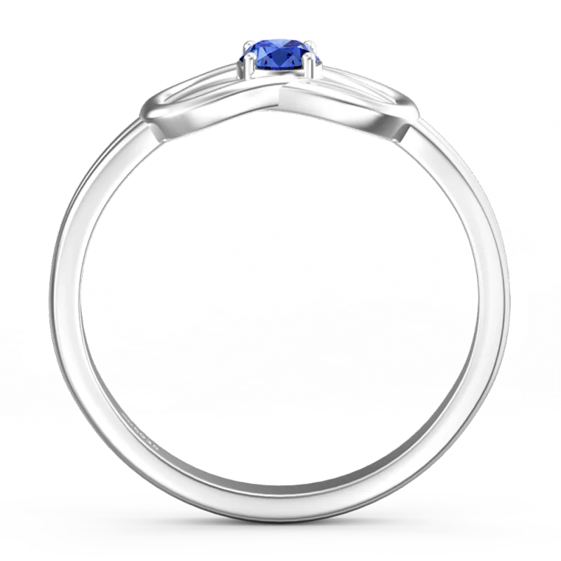 Silver ring with a blue gemstone on a white background